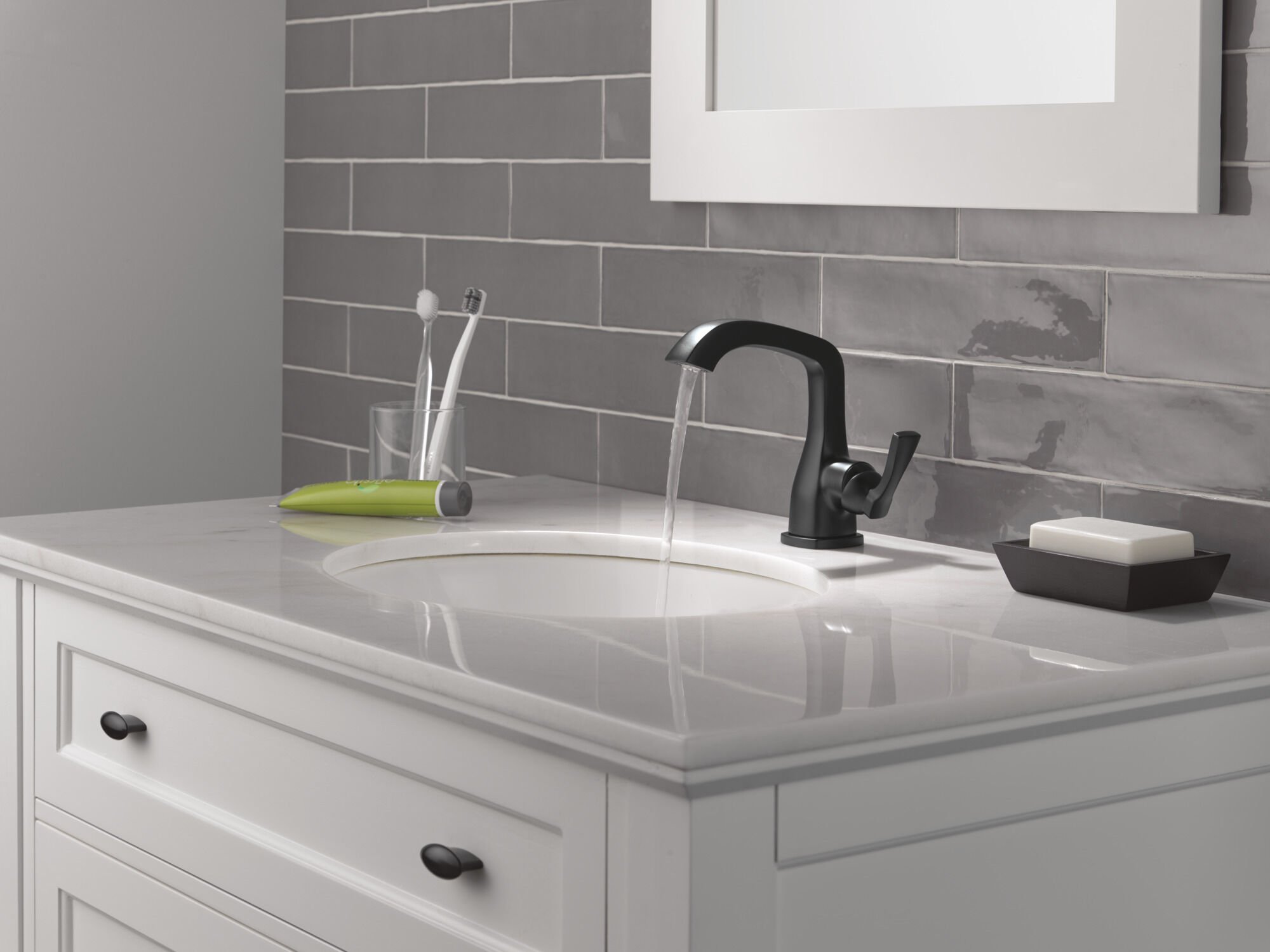 Single Handle Bathroom Faucet in Matte Black 576-BLMPU-DST | Delta