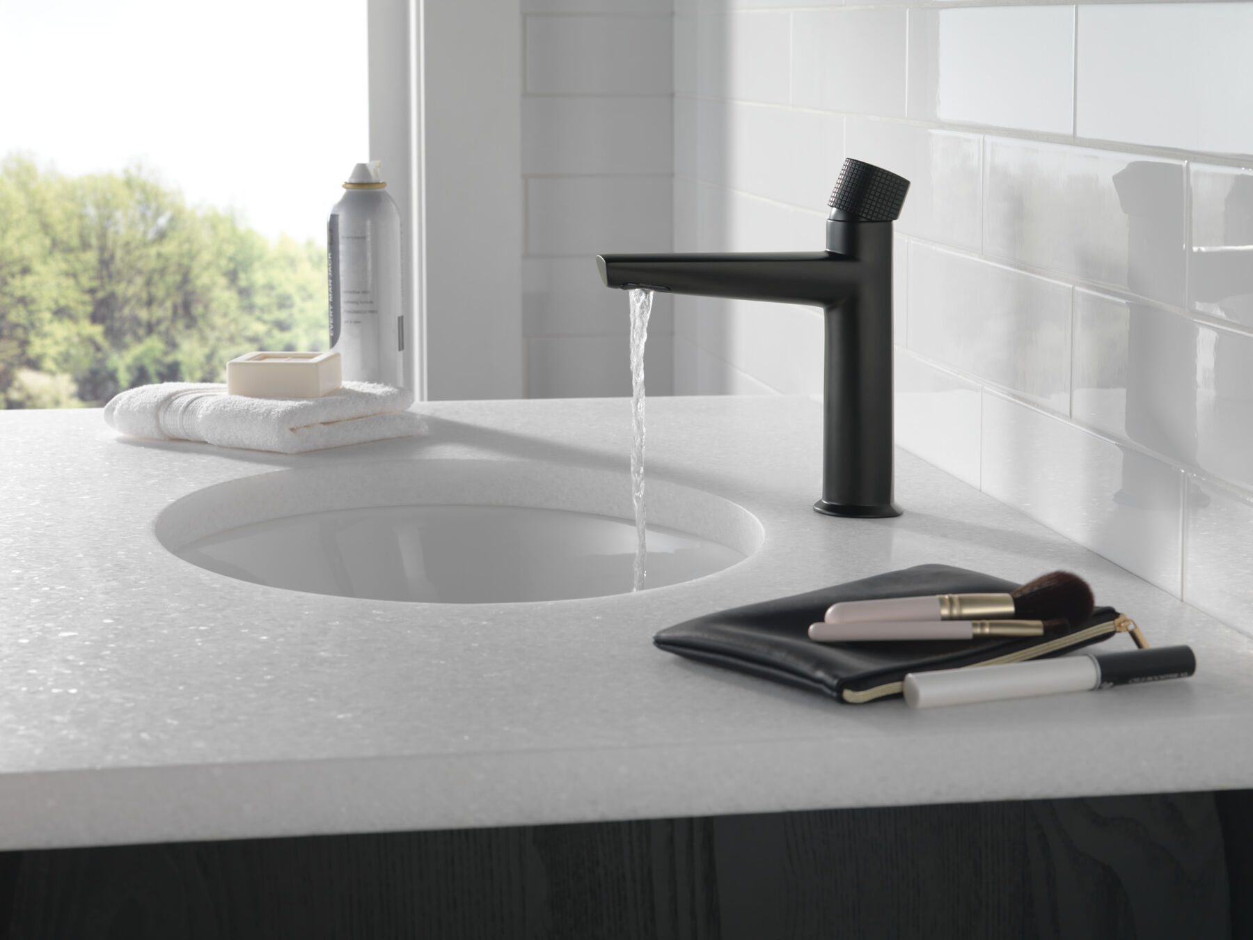 Single Handle Bathroom Faucet in Matte Black 573-BLMPU-DST | Delta 