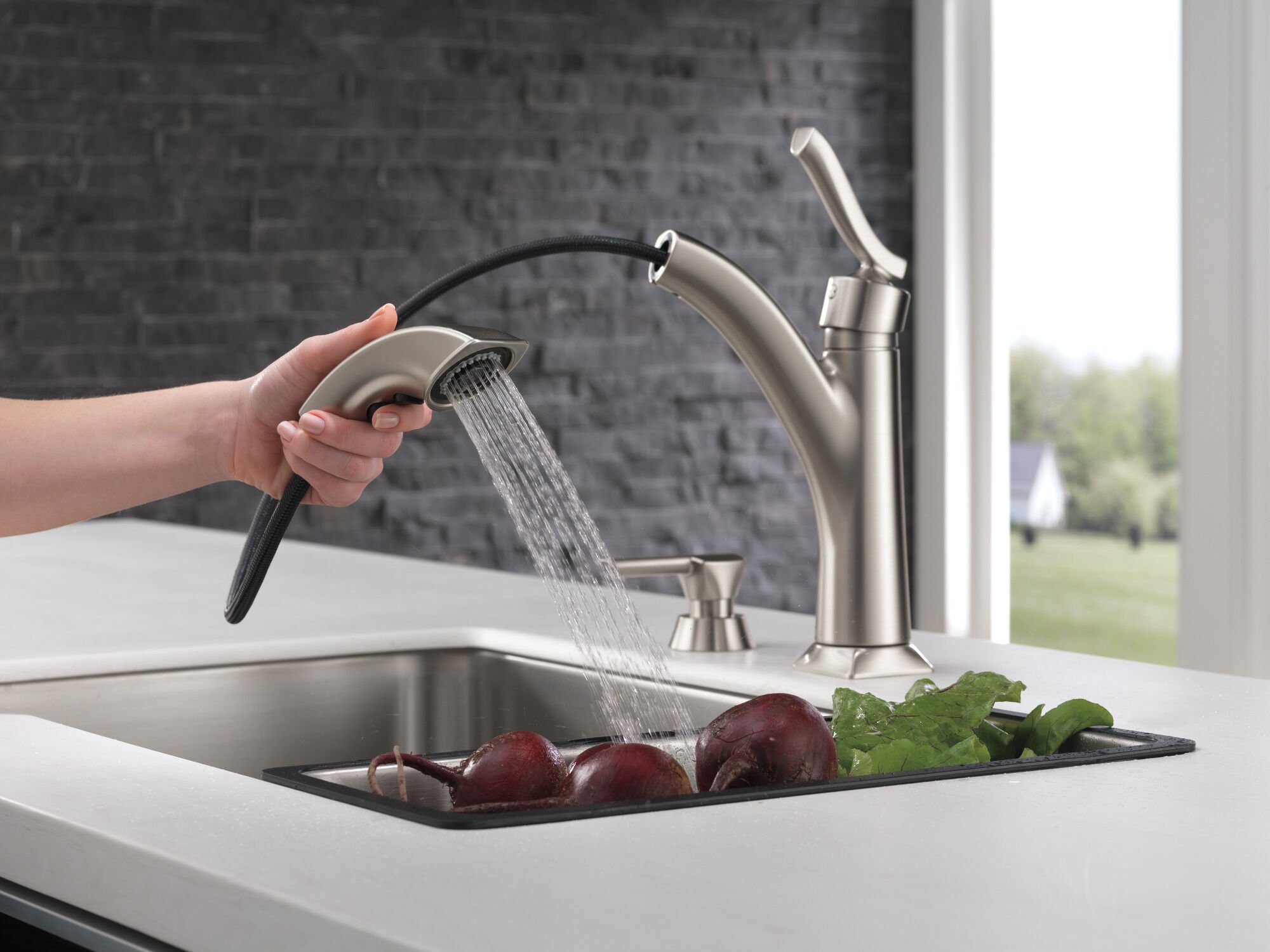 Single Handle Pull-Out Kitchen Faucet with Soap Dispenser in