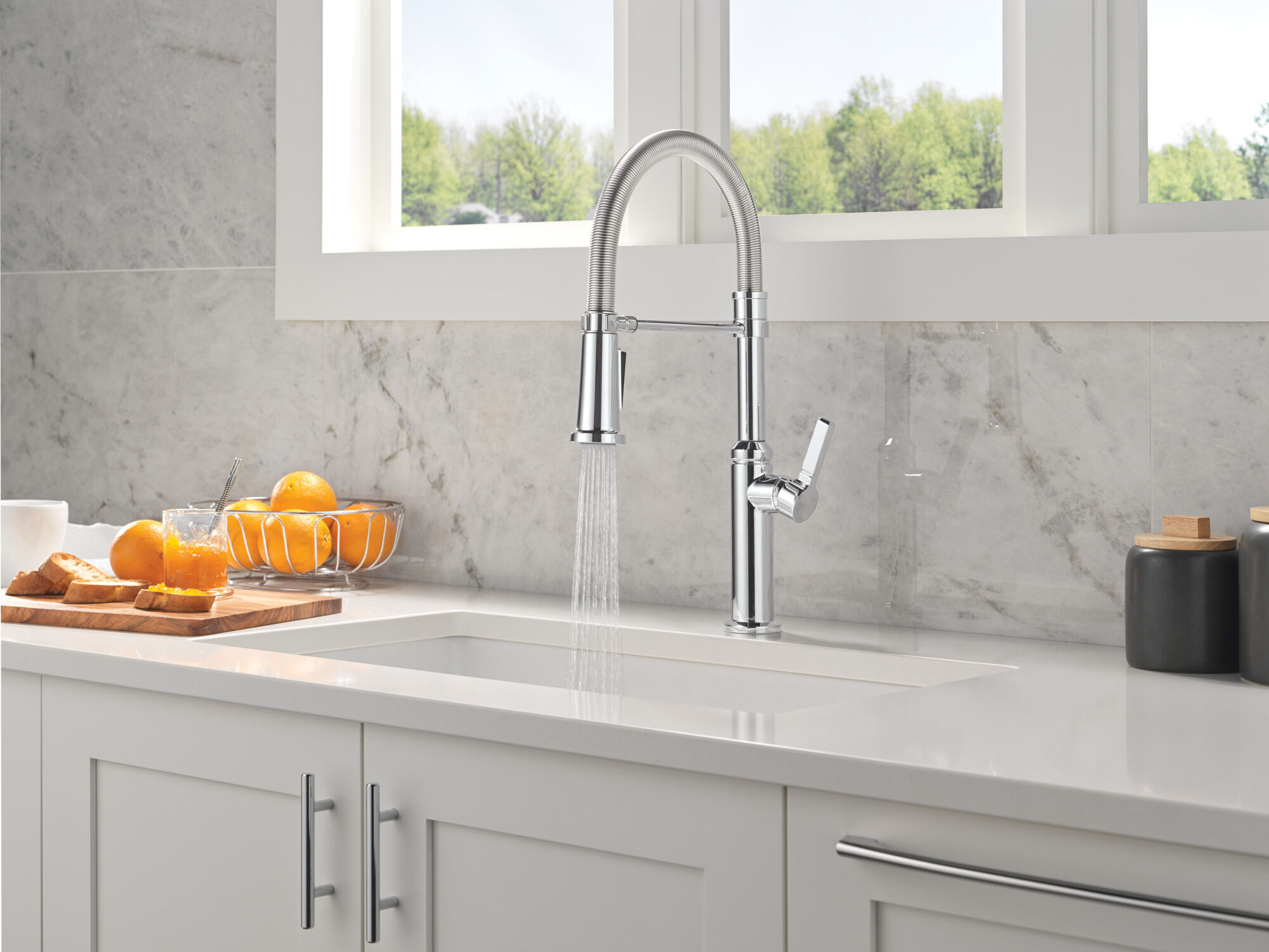 Single Handle Pull-Down Kitchen Faucet With Spring Spout in Chrome