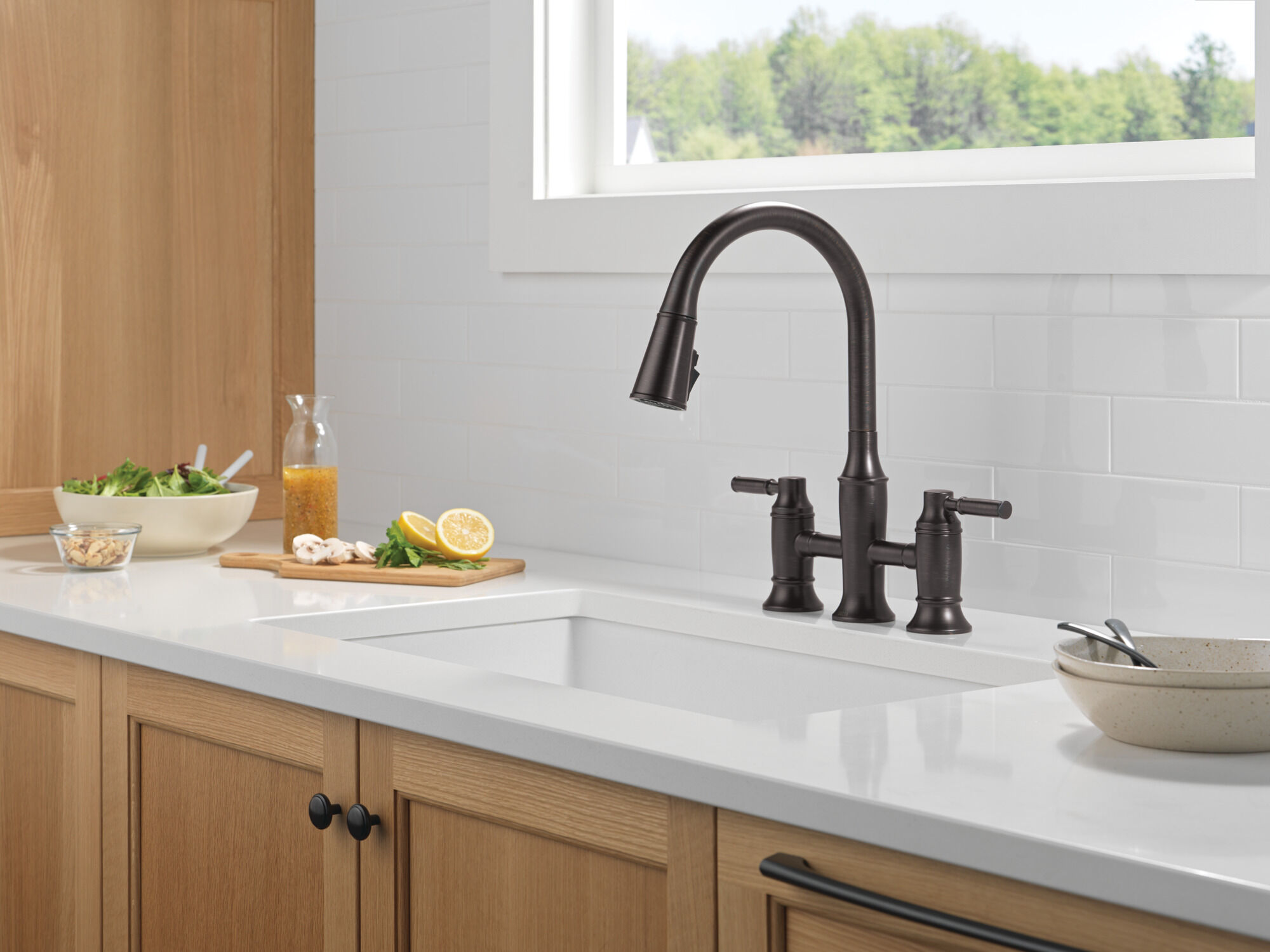 Two Handle Pull-Down Bridge Kitchen Faucet in Venetian Bronze