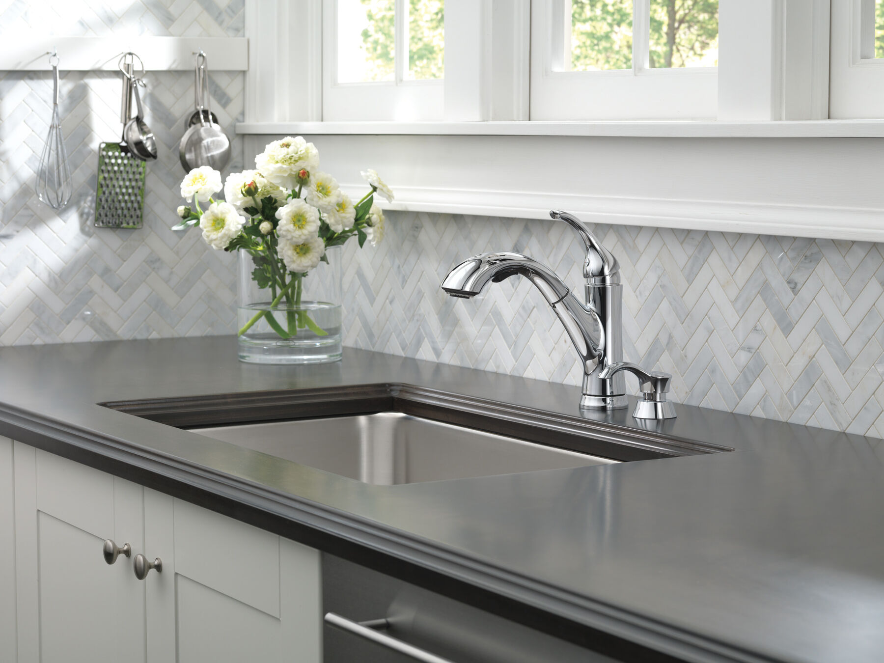 Single Handle PullOut Kitchen Faucet with Soap Dispenser in Chrome 16932SDDST Delta Faucet