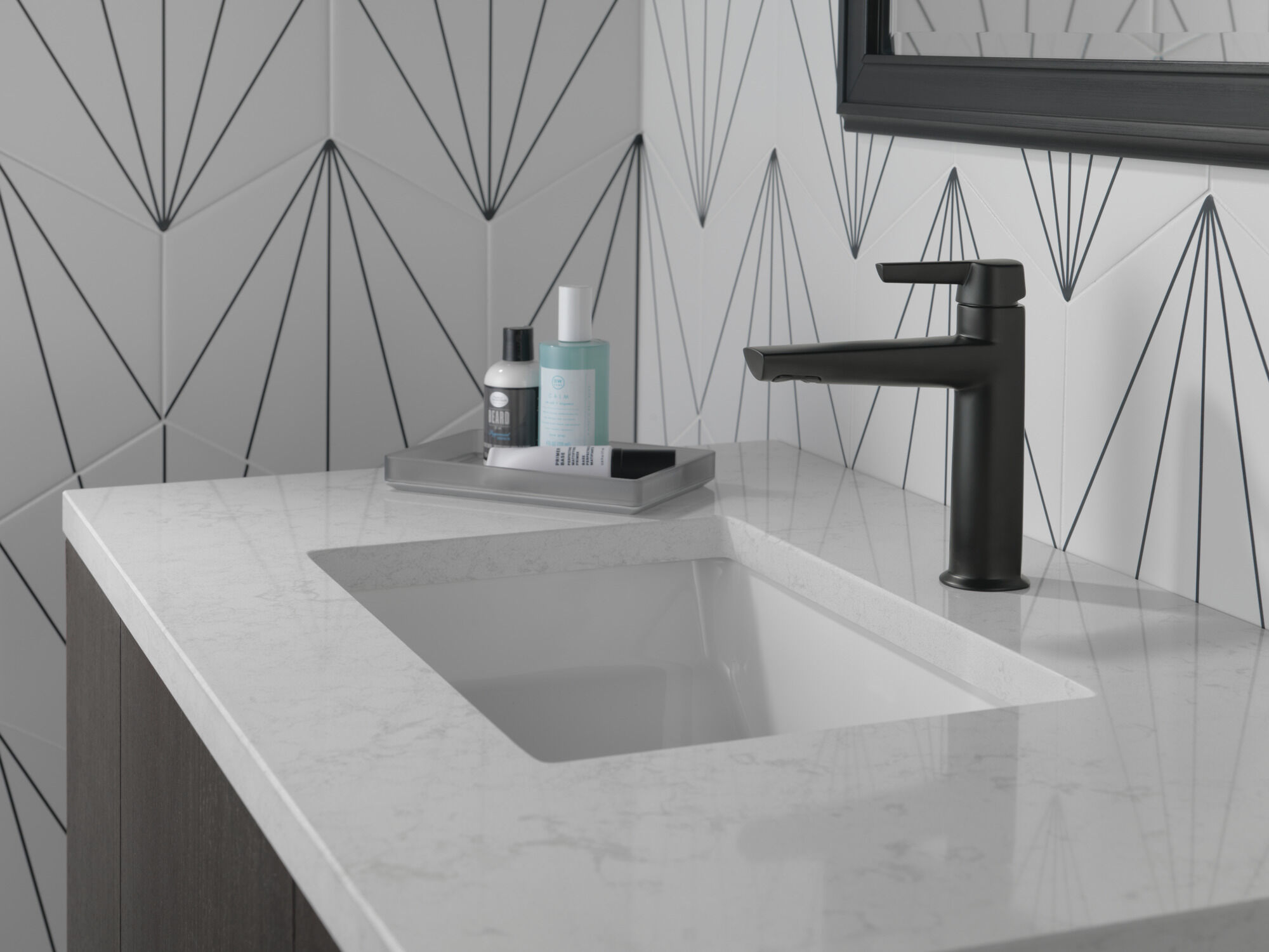 Single Handle Bathroom Faucet in Matte Black 571-BLMPU-DST | Delta