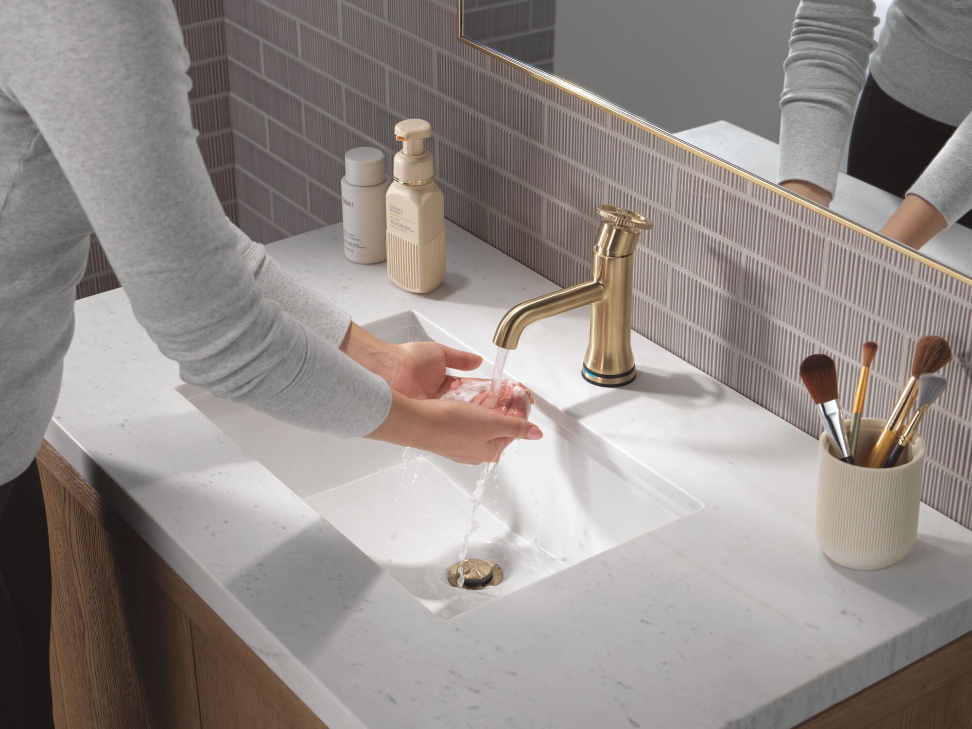 Touch2O Bathroom Faucet with Touchless Technology in Champagne