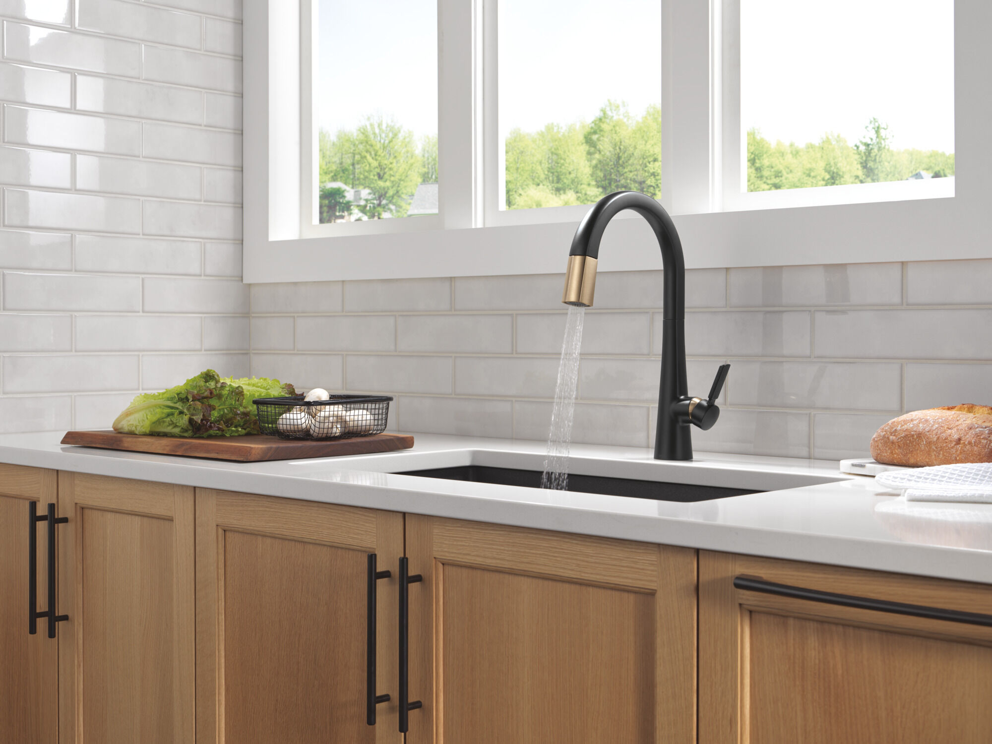 Single Handle Pull-Down Kitchen Faucet in Matte Black / Champagne