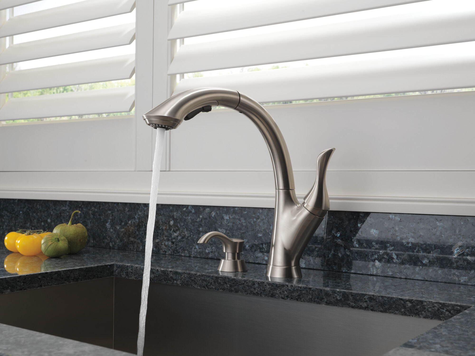 Single Handle Pull-Out Kitchen Faucet with Soap Dispenser in