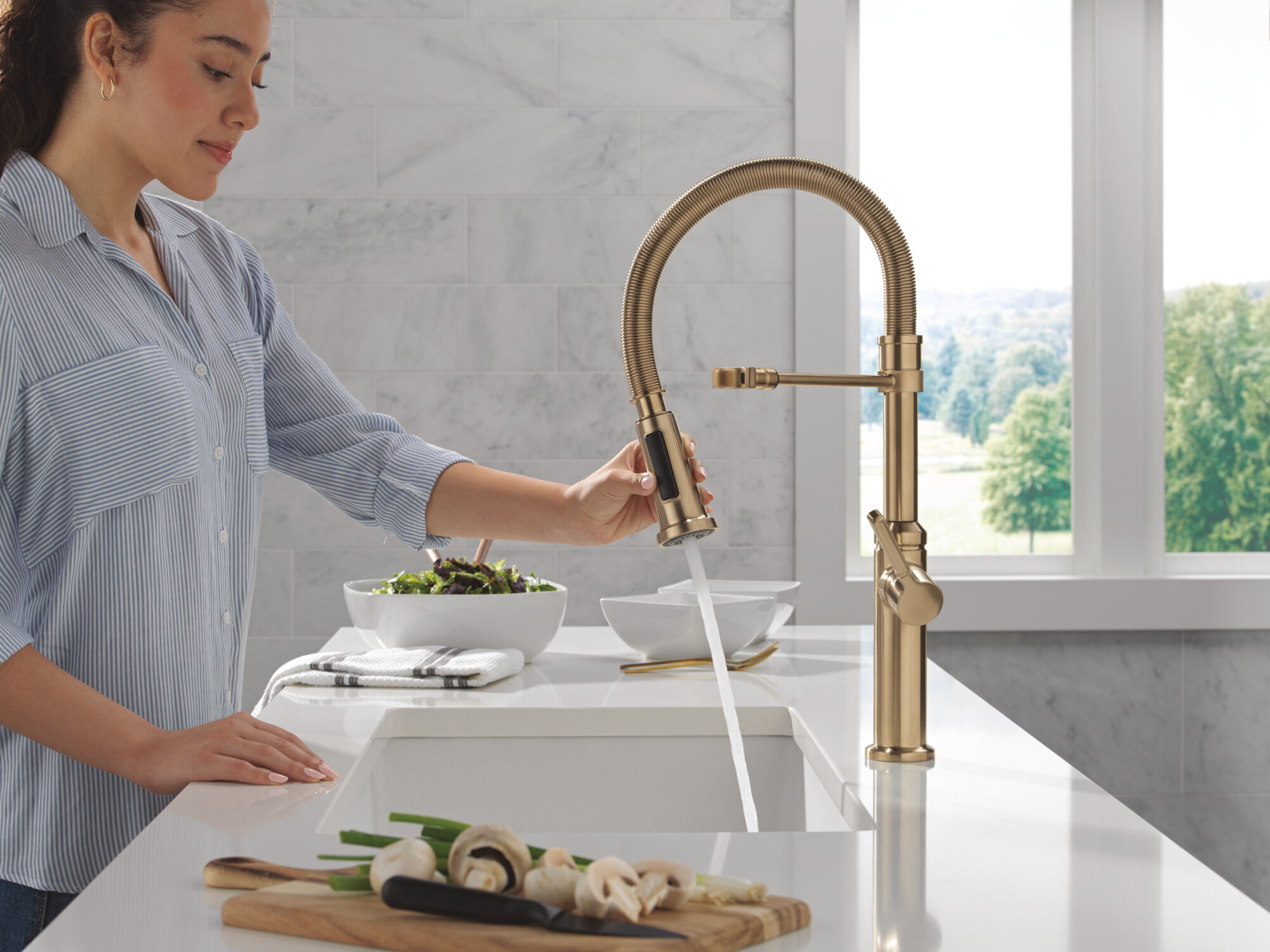 Single Handle Pull-Down Spring Kitchen Faucet in Champagne Bronze