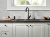 Single Handle Pull-Down Kitchen Faucet with Soap Dispenser and ShieldSpray&reg; Technology (Recertified)
