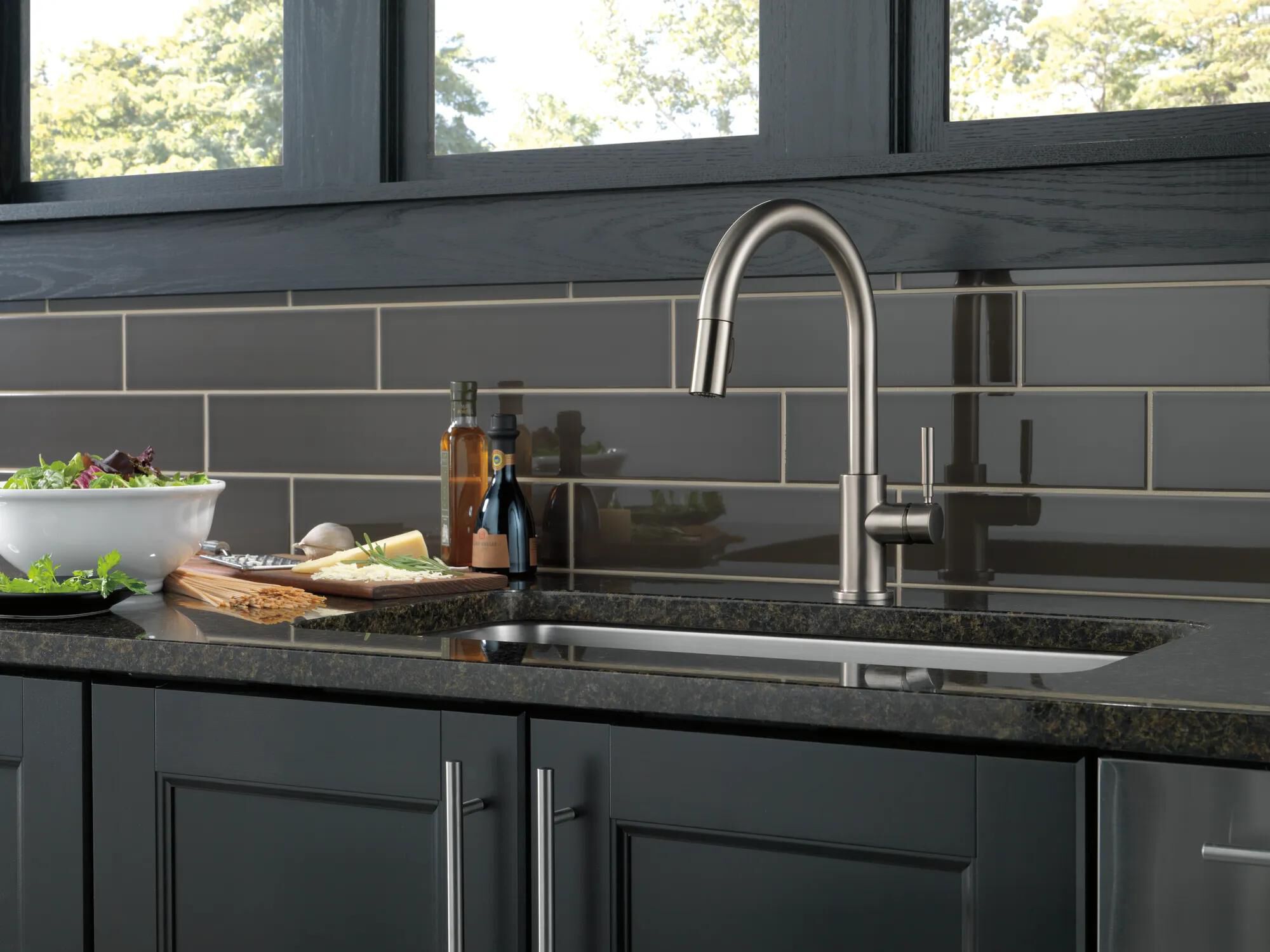 Single Handle Pull-Down Kitchen Faucet with Soap Dispenser in