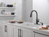 Single Handle Pull-Down Kitchen Faucet with Soap Dispenser and ShieldSpray&reg; Technology