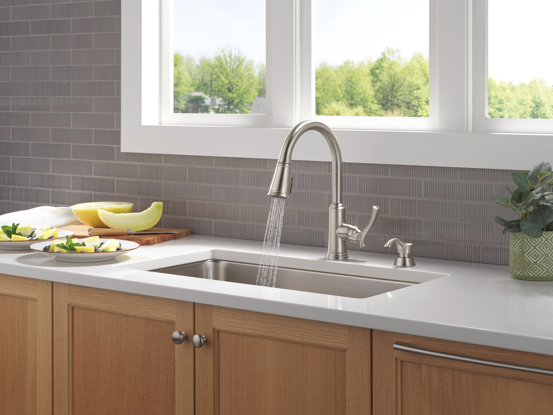 Single Handle Pull-Down Kitchen Faucet with Soap Dispenser and ShieldSpray&reg; Technology