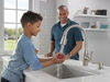 Single Handle Pull-Down Kitchen Faucet with Soap Dispenser and ShieldSpray&reg; Technology