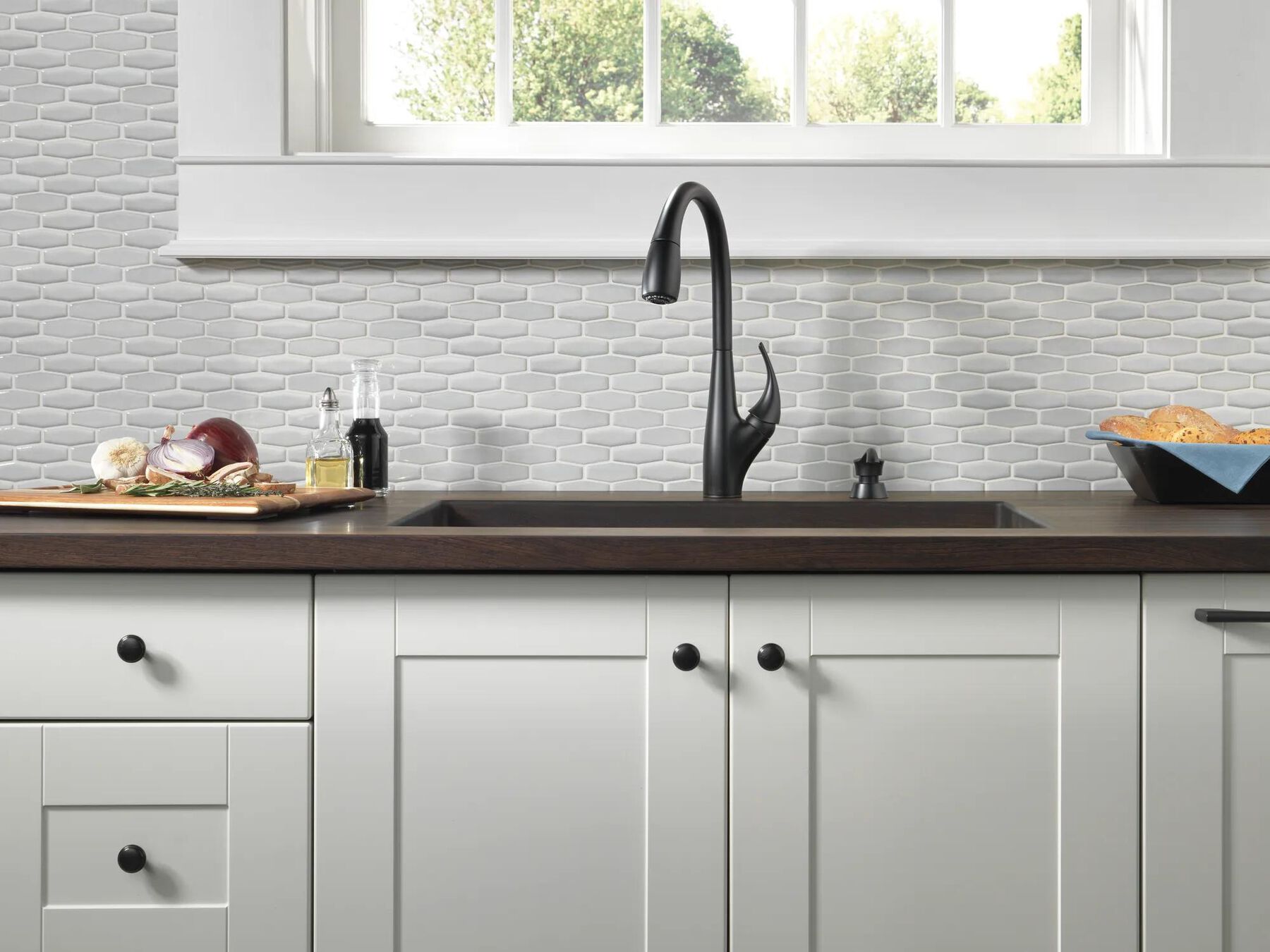 Single Handle Pull-Down Kitchen Faucet with Soap Dispenser and ShieldSpray&reg; Technology