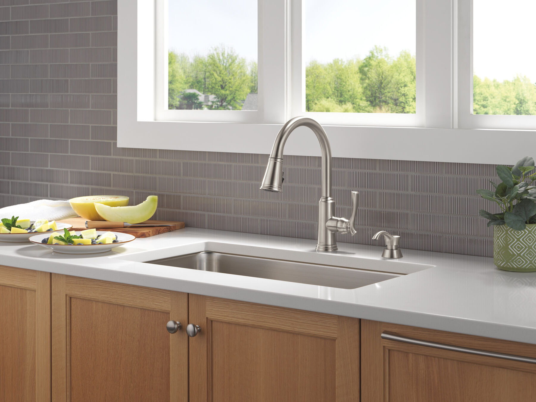 Single Handle Pull-Down Kitchen Faucet with Soap Dispenser and ShieldSpray&reg; Technology