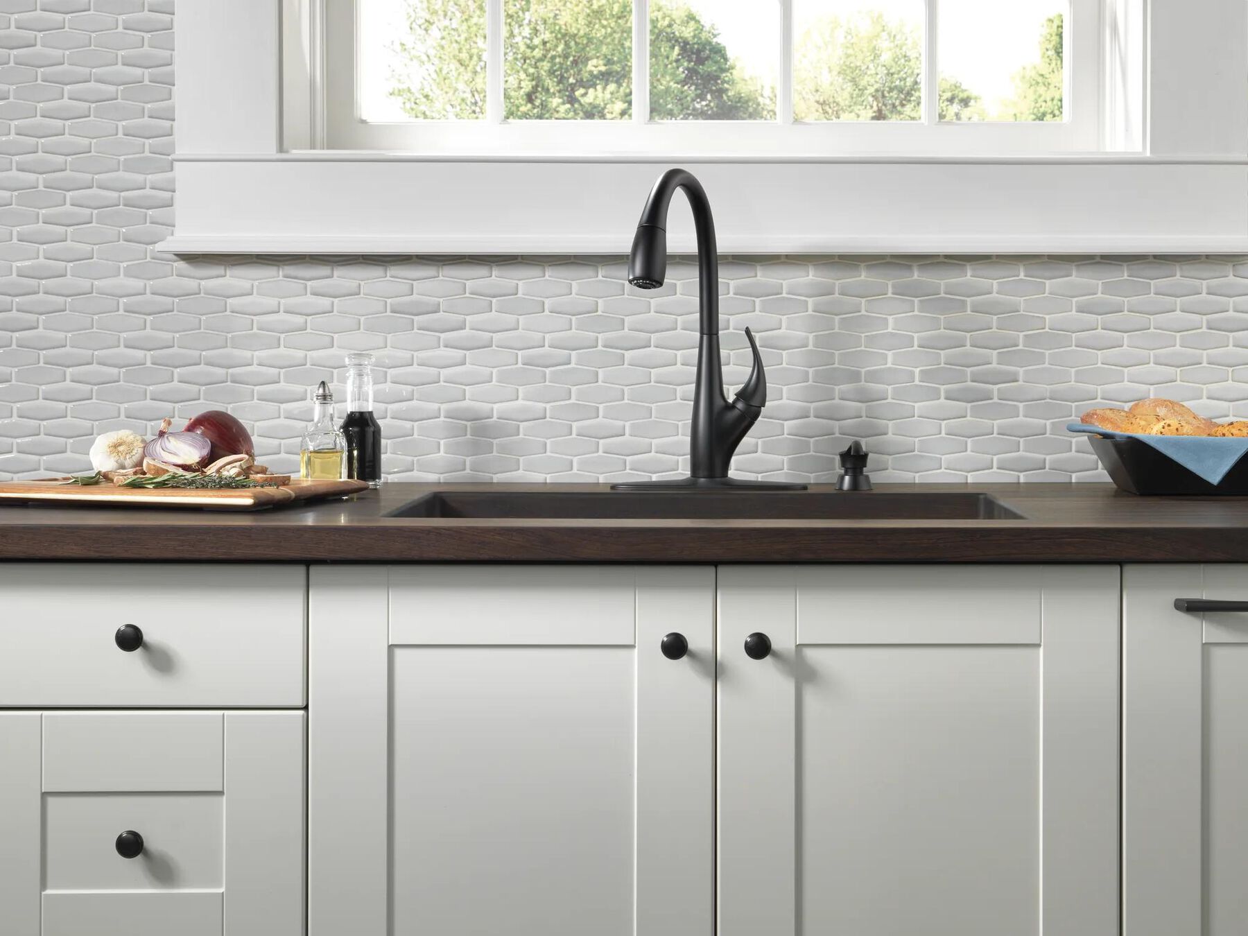 Single Handle Pull-Down Kitchen Faucet with Soap Dispenser and ShieldSpray&reg; Technology