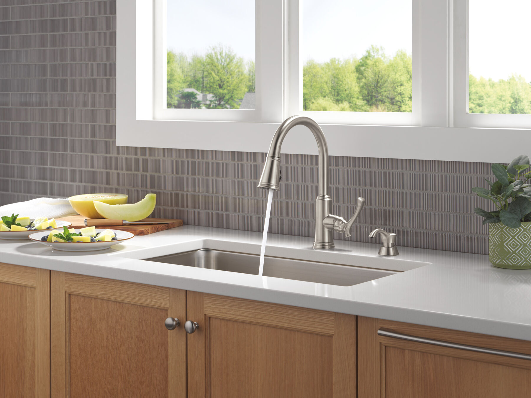 Single Handle Pull-Down Kitchen Faucet with Soap Dispenser and ShieldSpray&reg; Technology