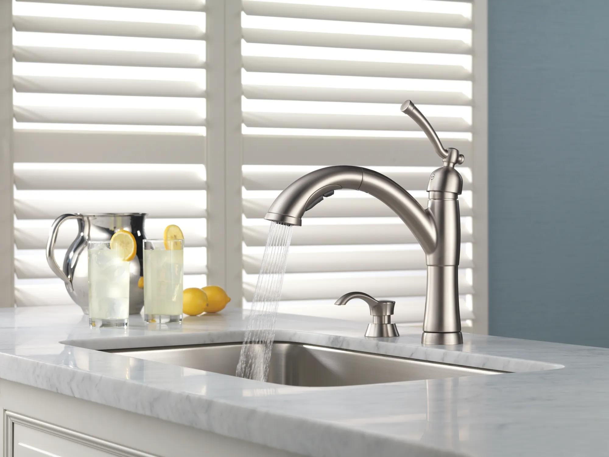 Single Handle Pull-Out Kitchen Faucet with Soap Dispenser in
