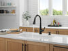 Single Handle Pull-Down Kitchen Faucet with Soap Dispenser and ShieldSpray&reg; Technology