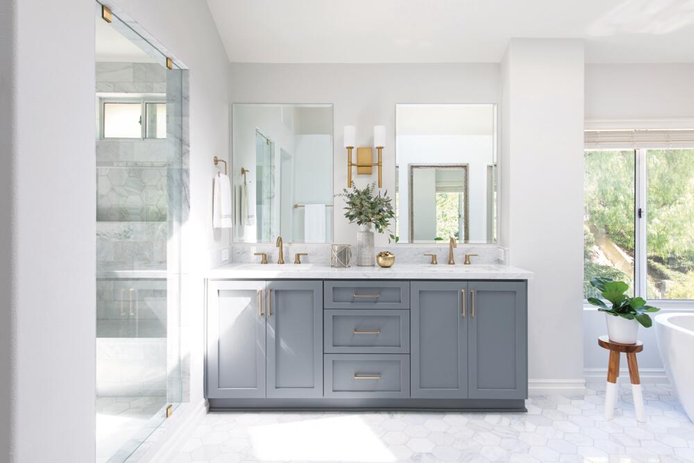 Trinsic Two Handle Widespread Bathroom Faucet in a bright modern bathroom