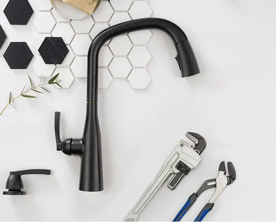 Matte black single handle Delta faucet and faucet parts are shown with other kitchen design samples 